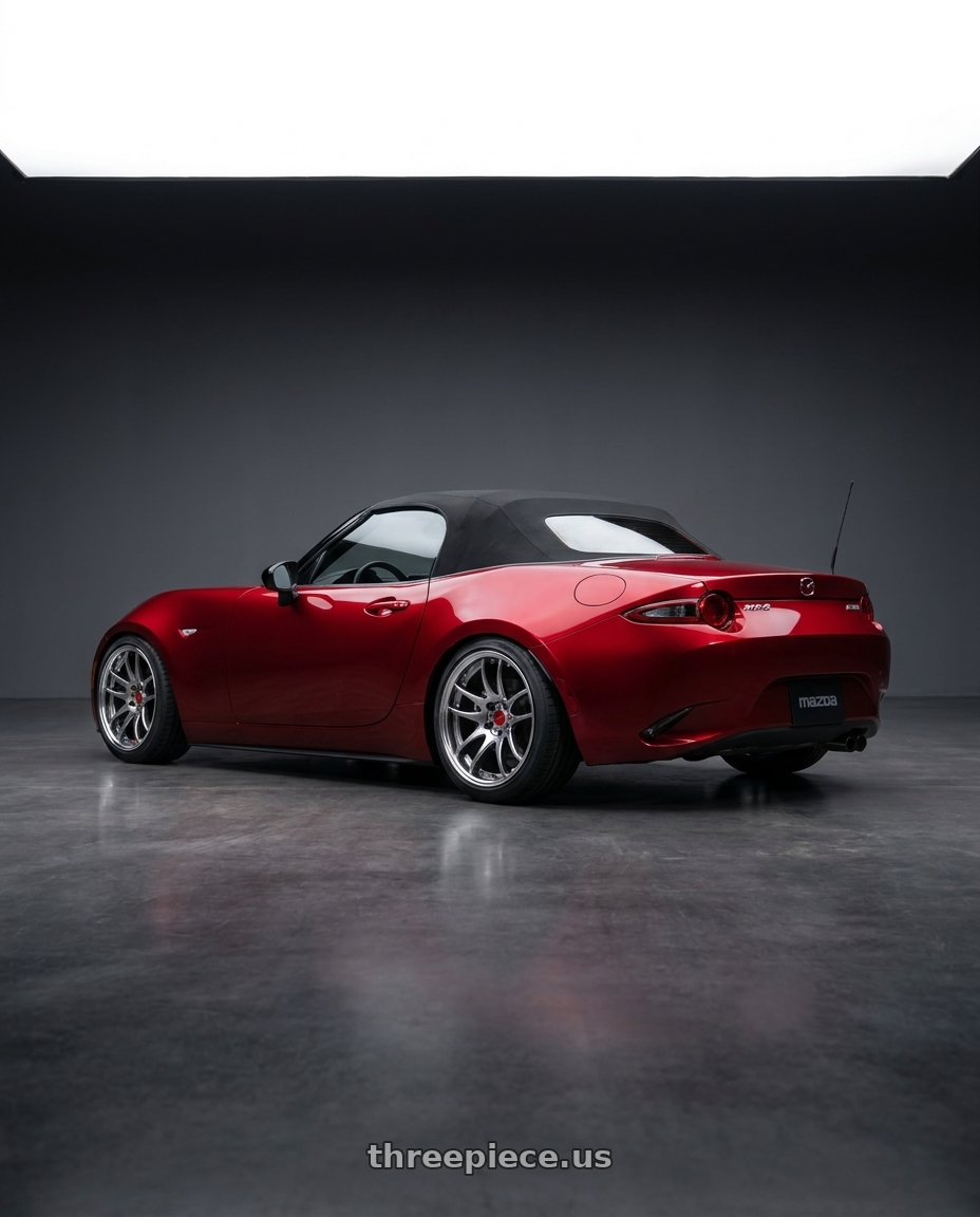 2024 Mazda MX-5 Miata Sport with Work Cr 2P 4x100 17x8.0 +38 GT Silver wheels rear three quarter view square tires