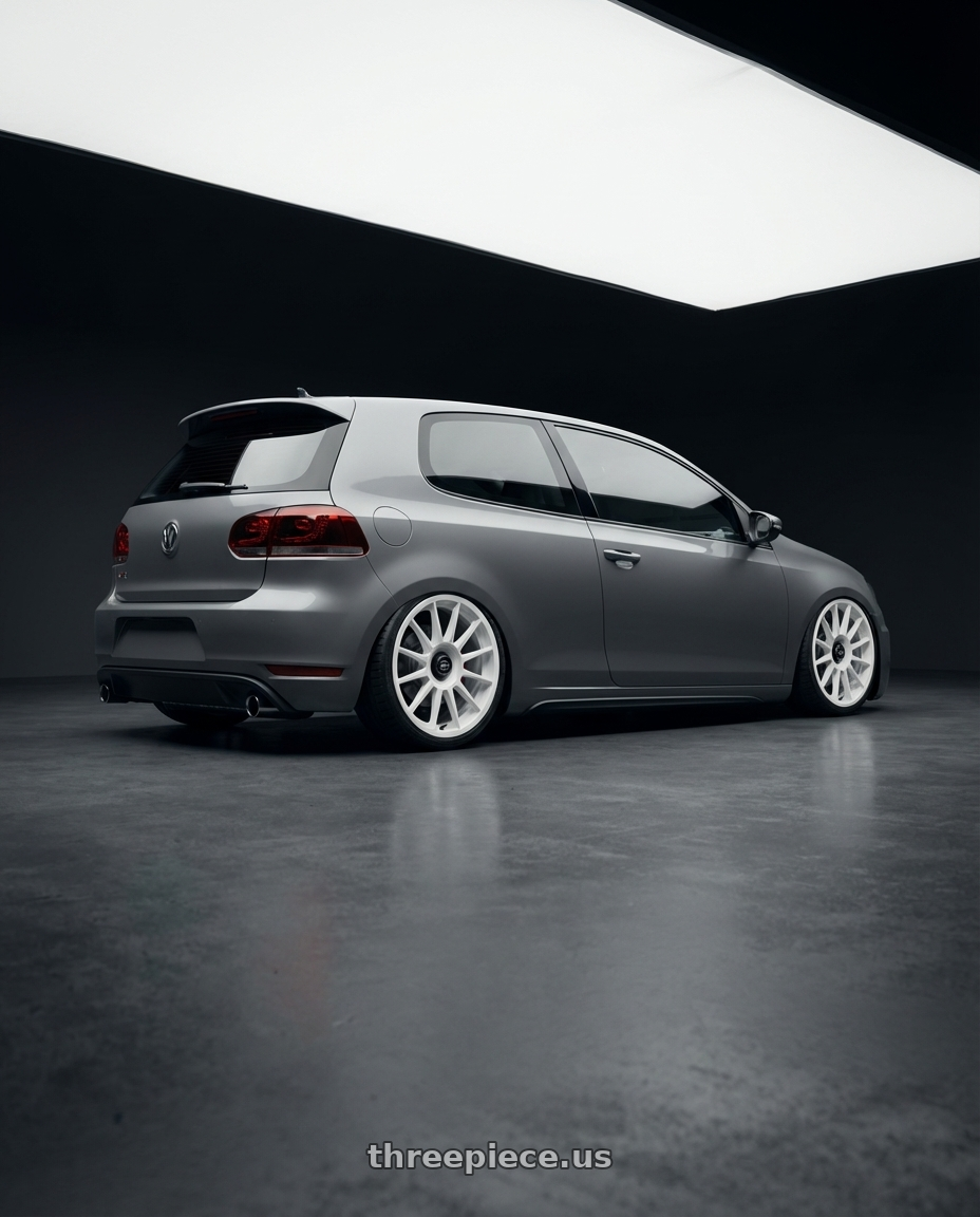 2013 Volkswagen GTI MK6 with fifteen52 PODIUM 5x112 / 5x120 18x8.5 +35 RALLY WHITE (GLOSS WHITE) wheels rear three quarter view slight stretch tires