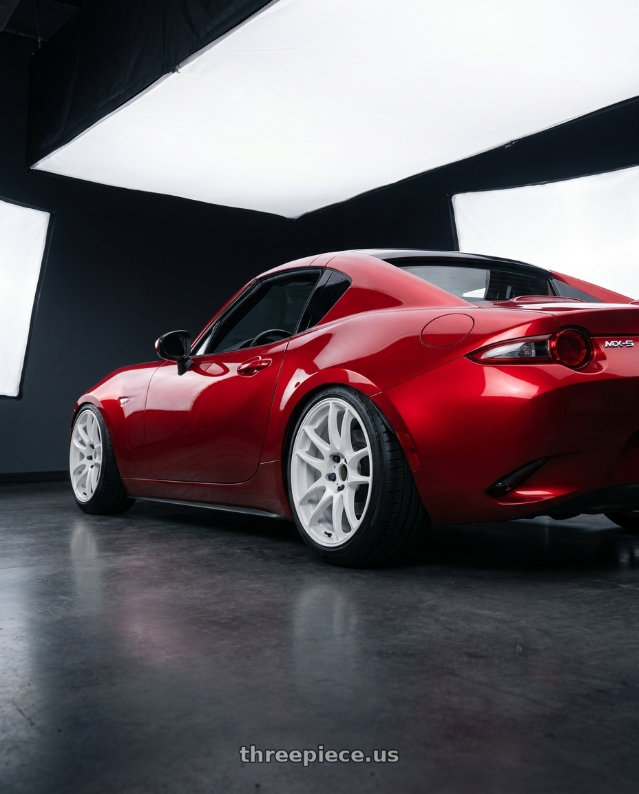2018 Mazda Mx-5 with Work Emotion Cr Kiwami 5x100 17x8 +35 White wheels rear three quarter view meaty tires