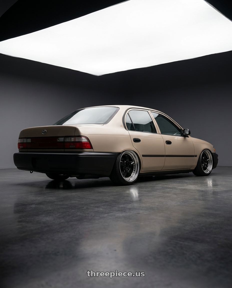 1993 Toyota corolla with Work Meister S1 3P 5x100 18x7+35 A Disk Black wheels rear three quarter view slight stretch tires