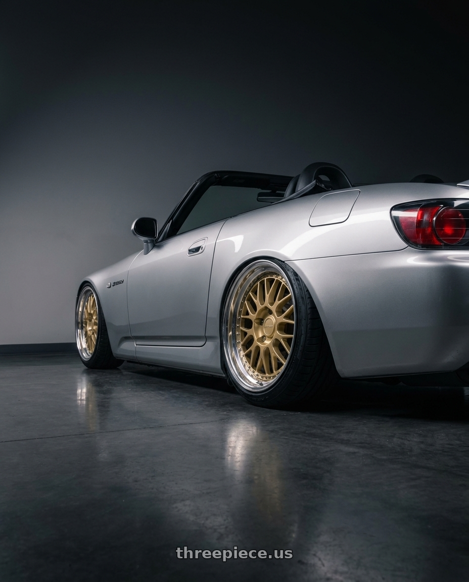2000 Honda S2k with Work Brombacher Mesh wheels rear three quarter view slight stretch tires