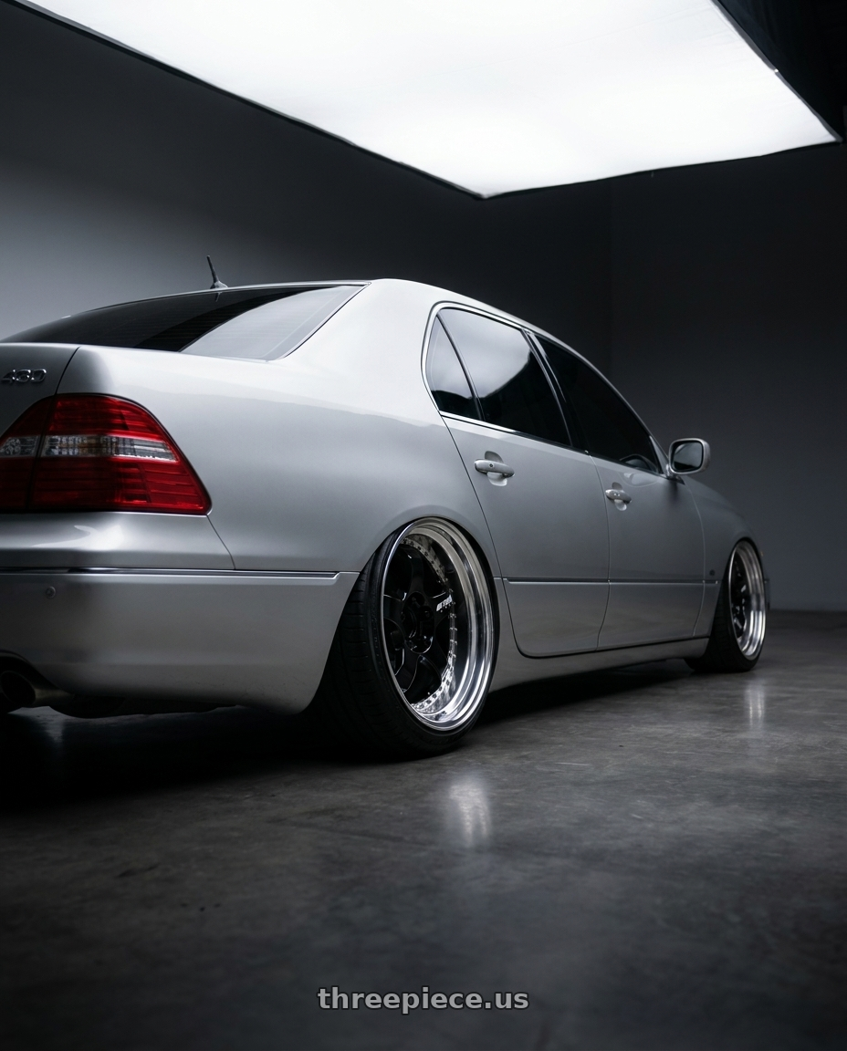 2004 lexus ls430 with Work Meister S1 3P 5x114.3 18x10+35 A Disk Black wheels rear three quarter view extreme stretch tires