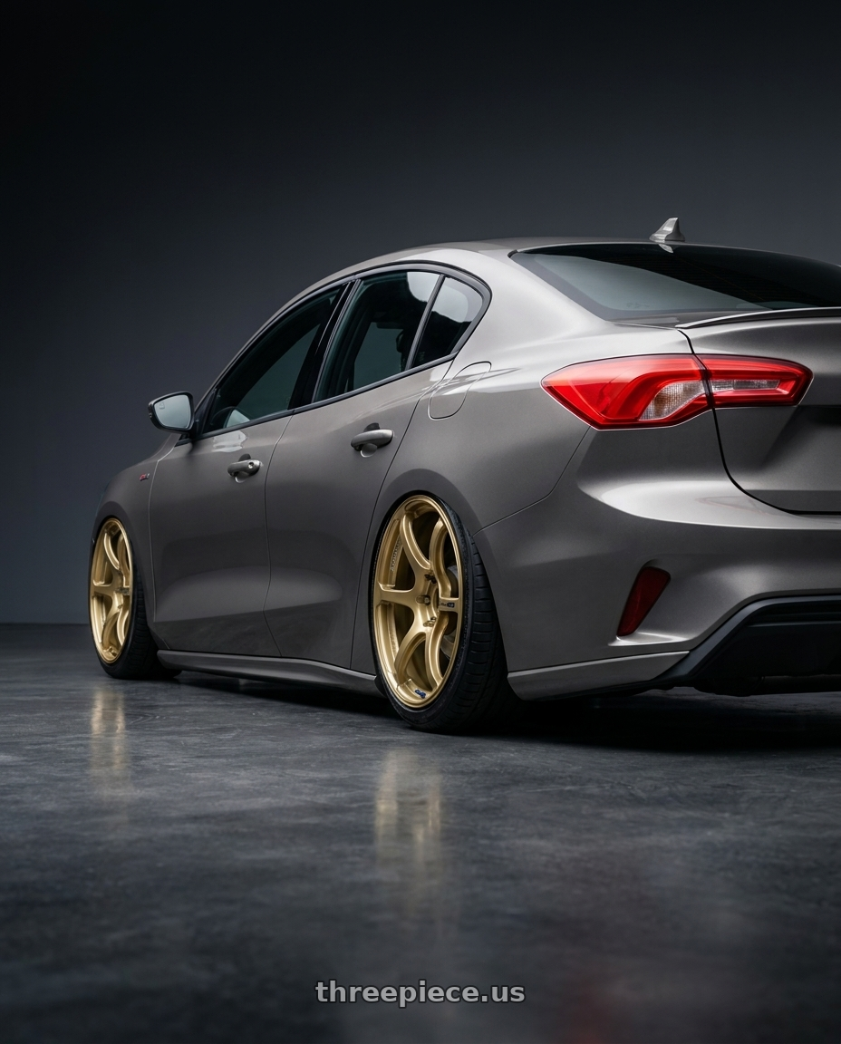 2020 Ford focus sedan st line with Advan RGIII 5x112 19x8.5+45 Gold wheels rear three quarter view slight stretch tires
