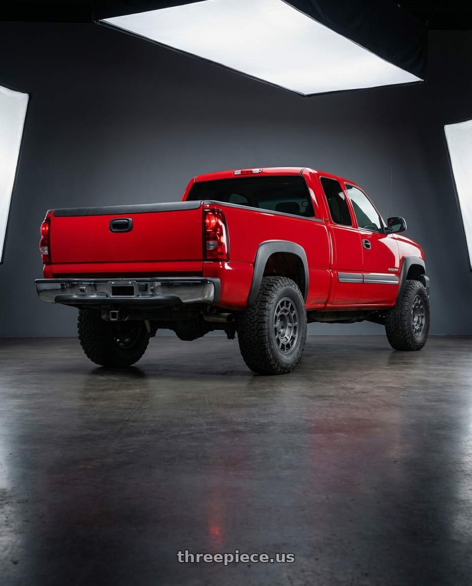 2005 Chevy Silverado with fifteen52 METRIX HD 5x127 17x8.5 +0 CARBON GREY (SATIN GUNMETAL) wheels rear three quarter view meaty tires