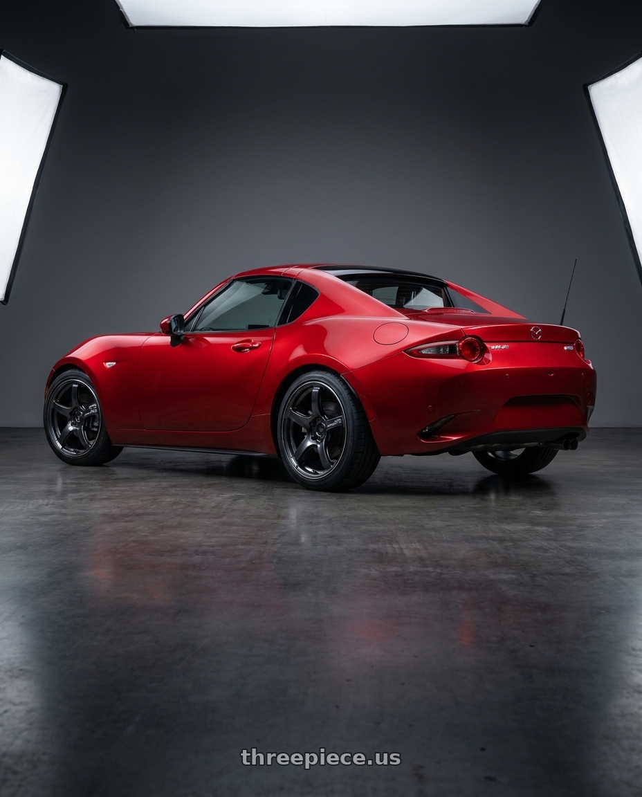 2017 Mazda Mx-5 with Advan Racing TC4 4x100 16x7.0 +31 BLACK GUNMETALLIC & RING wheels rear three quarter view square tires