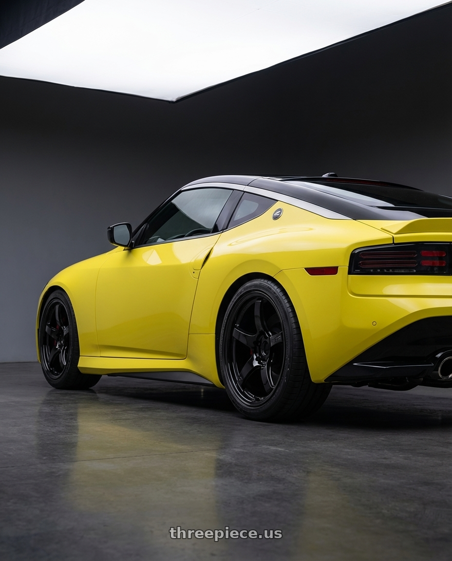 2024 Nissan Z with Gram Lights 57CR 5x114.3 19x10.5+35 Glossy Black wheels rear three quarter view square tires