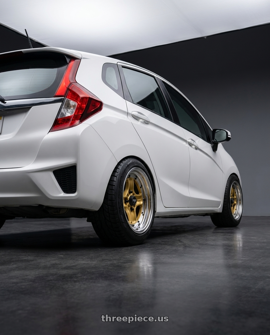 2016 Honda fit ex with Work Equip 40 4x100 15x9.5 -25 o disk Sprint Gold wheels rear three quarter view meaty tires