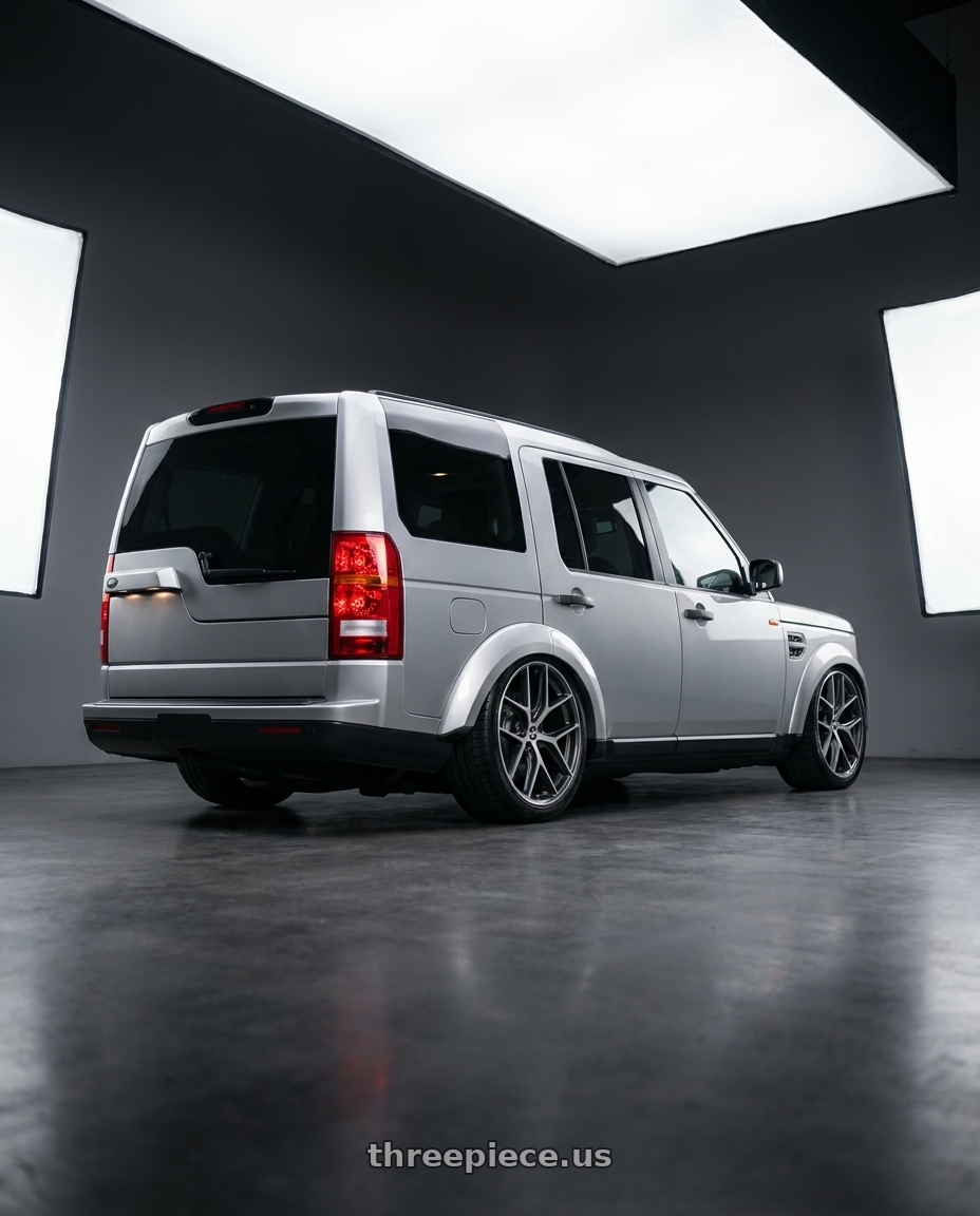 2005 Land Rover Discovery 3 with BBS CC-R 5x120 19x9.5+40 Graphite w/ Diamond Cut Face wheels rear three quarter view slight stretch tires