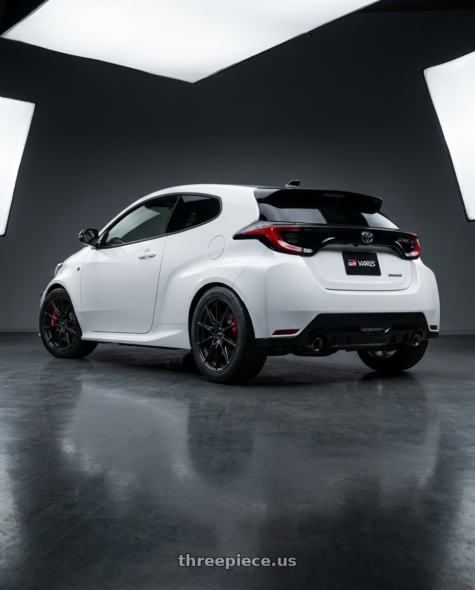 2023 GR Yaris  with Rotiform 1PC R168 DTM 5X100/5X112 18X8.5 +35 SATIN BLACK wheels rear three quarter view meaty tires