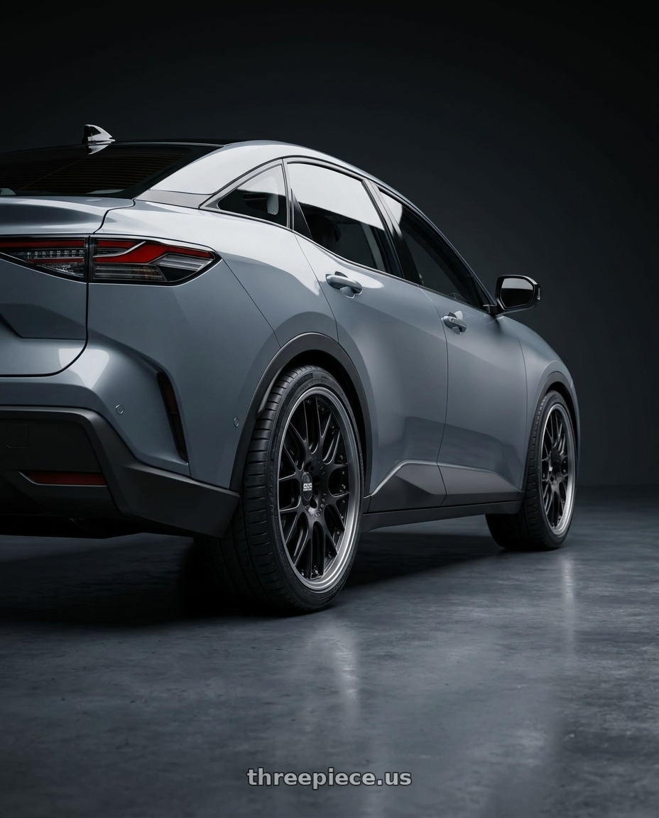 2026 Toyota Bz3x with BBS CH-RII 5x112 20x9 +30 Satin Black Center Platinum Lip Stainless Steel Rim Prot wheels rear three quarter view square tires