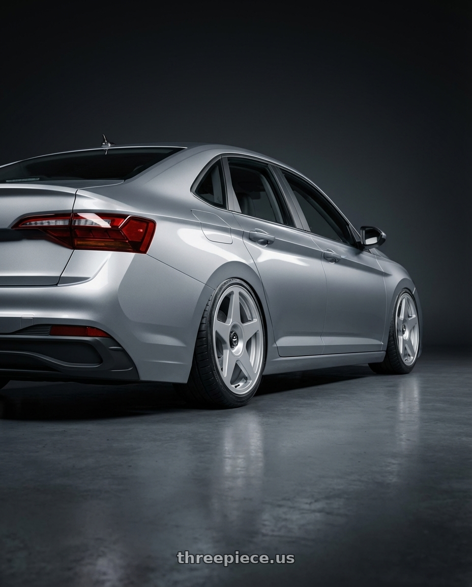 2024 Volkswagen Jetta  with fifteen52 TARMAC EVO 5x108 / 5x112 18x8.5 +45 SPEED SILVER (GLOSS SILVER) wheels rear three quarter view extreme stretch tires