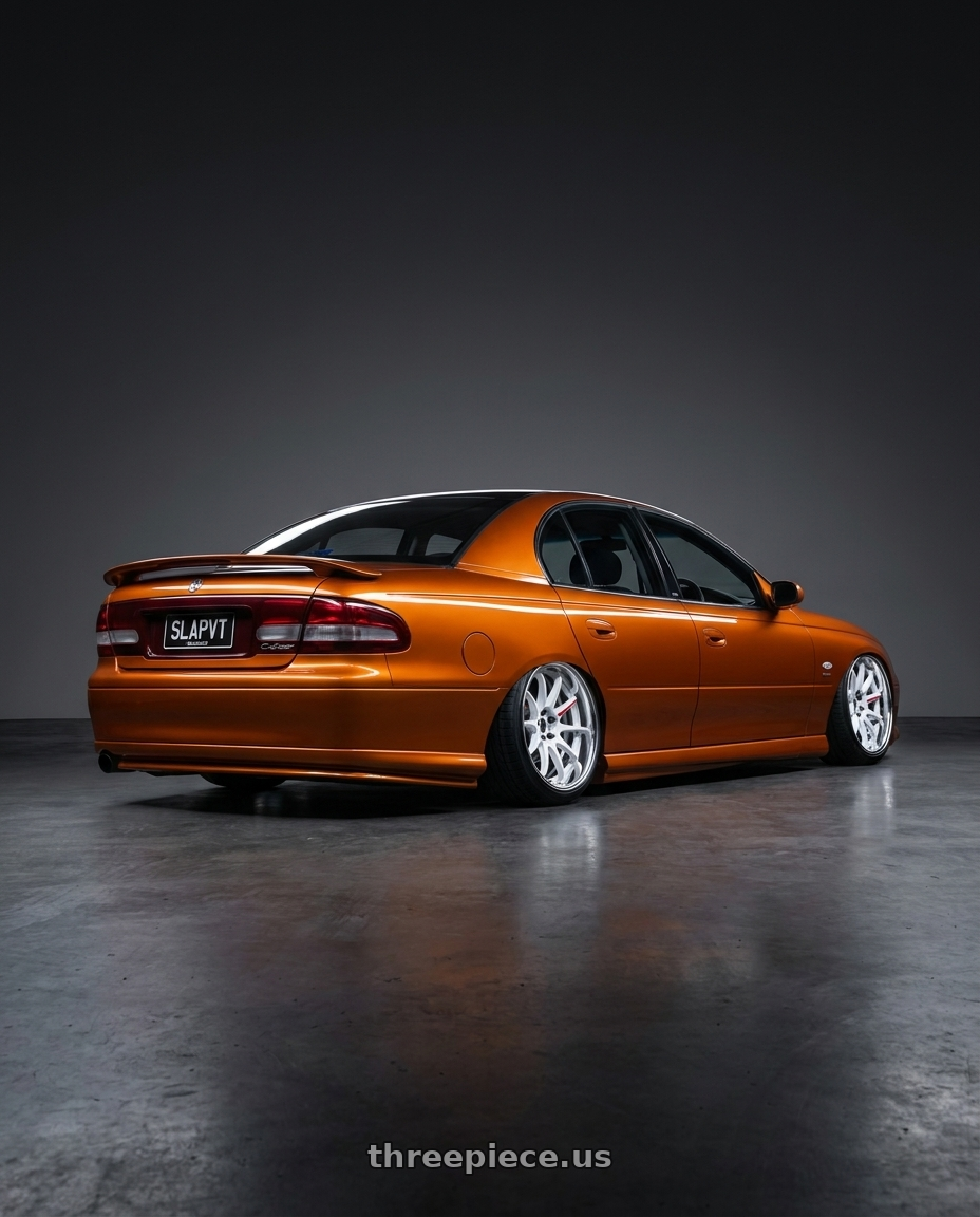2000 holden vt spac with Work Zr10 2P 5x114.3 19x11.0 +22 Azure White wheels rear three quarter view extreme stretch tires