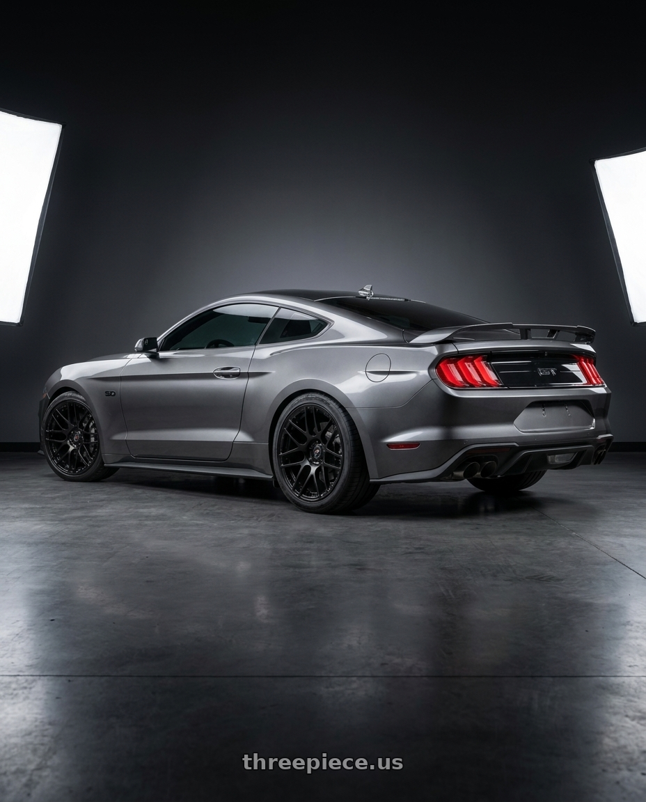 2021 Mustang GT with Forgestar F14 Beadlock 5x114.3 15x10 +25 Satin Black wheels rear three quarter view square tires