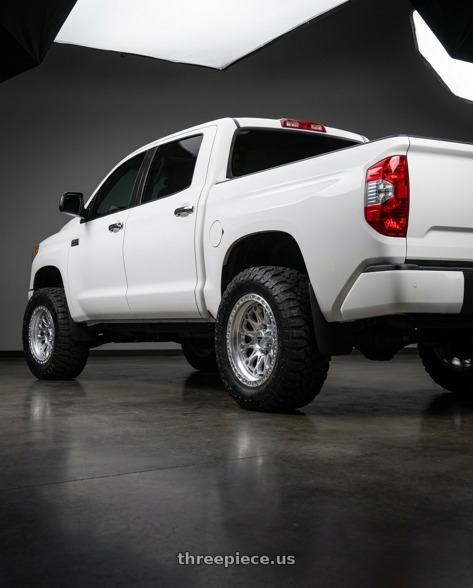 2016 toyota tundra platinum with Fittipaldi Offroad FT101MS 5x150 20x9 +18 Gloss Silver with Machined Face and Undercut wheels rear three quarter view meaty tires