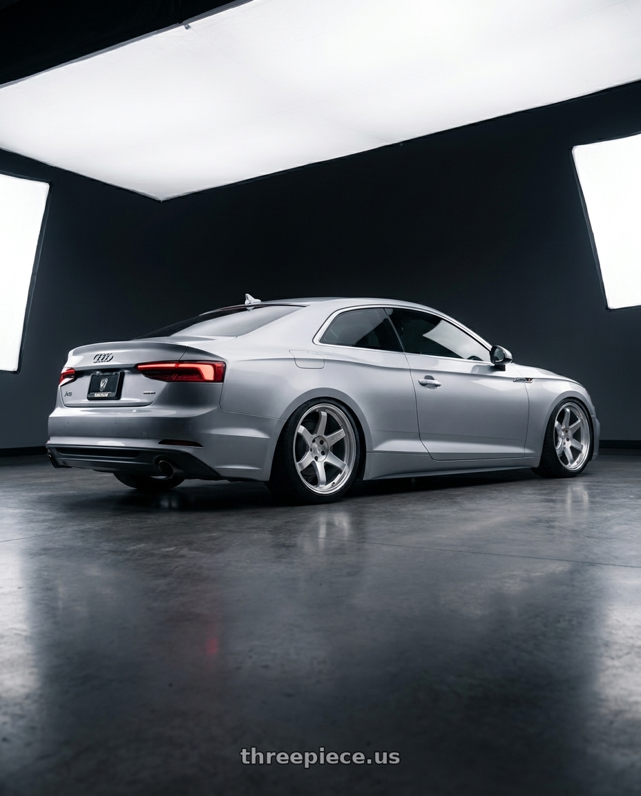 2018 Audi A5 with Volk Racing TE37 ULTRA M-SPEC 5x112 19x9.5+23 Diamond Silver wheels rear three quarter view square tires