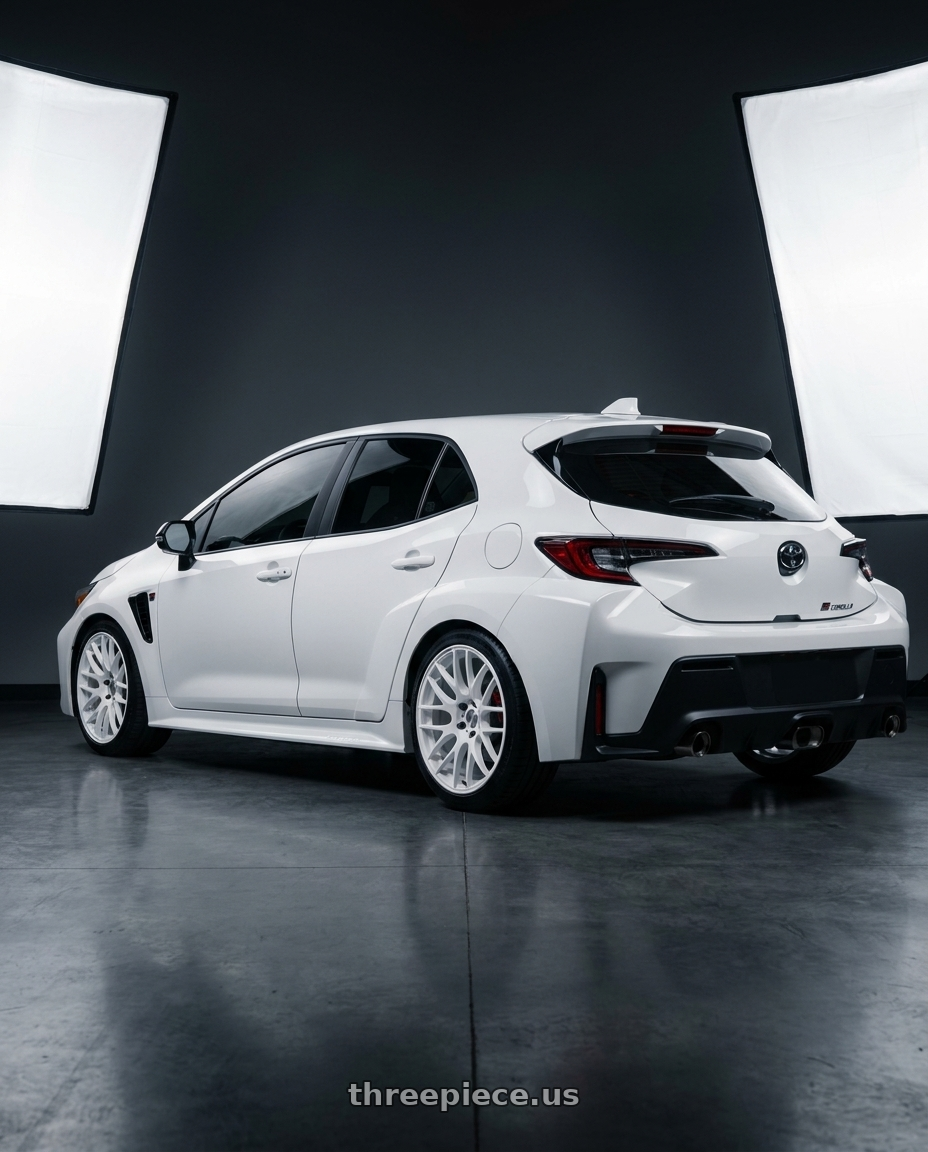 2026 Toyota GR Corolla with Work Emotion m8r 5x114.3 18x8.5 +30 White wheels rear three quarter view square tires
