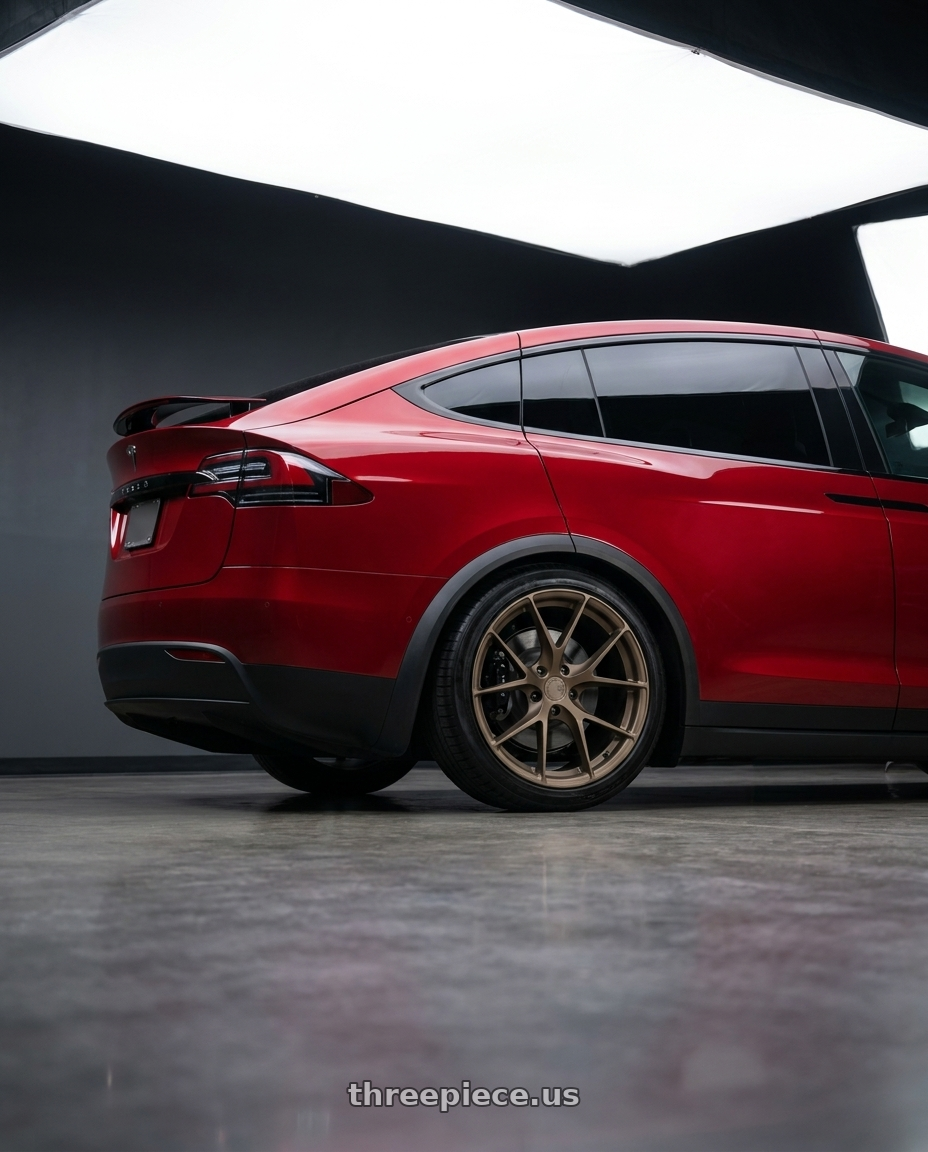 2024 Tesla Model X with Aodhan AFF7 5x120 19x8.5+35 Matte Bronze wheels rear three quarter view square tires