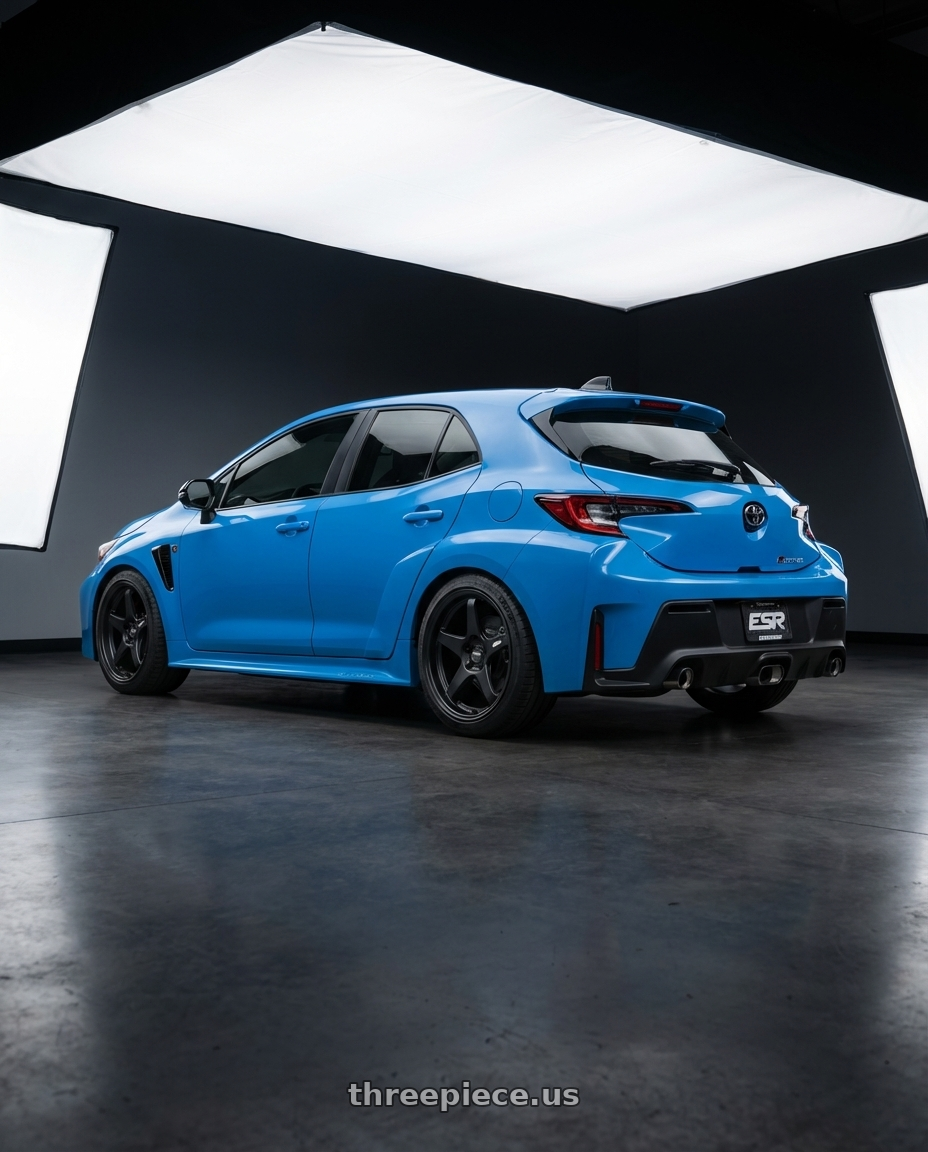 2024 Toyota GR Corolla with ESR Wheels APEX SERIES AP5 5x114.3 18x10.5 +22 Matte Black wheels rear three quarter view square tires