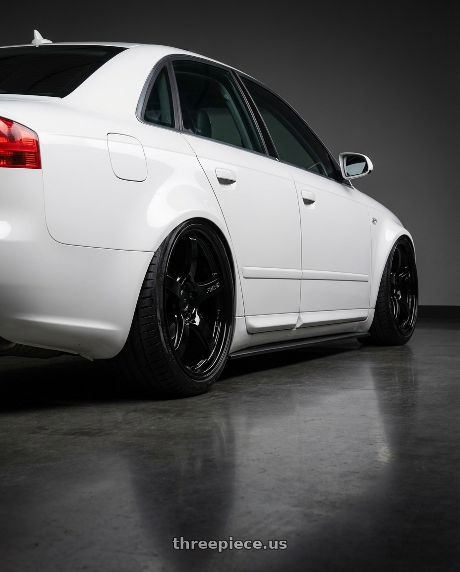 2010 Audi A4 B7 with Gram Lights 57CR 5x112 19x9.5+25 Glossy Black wheels rear three quarter view slight stretch tires