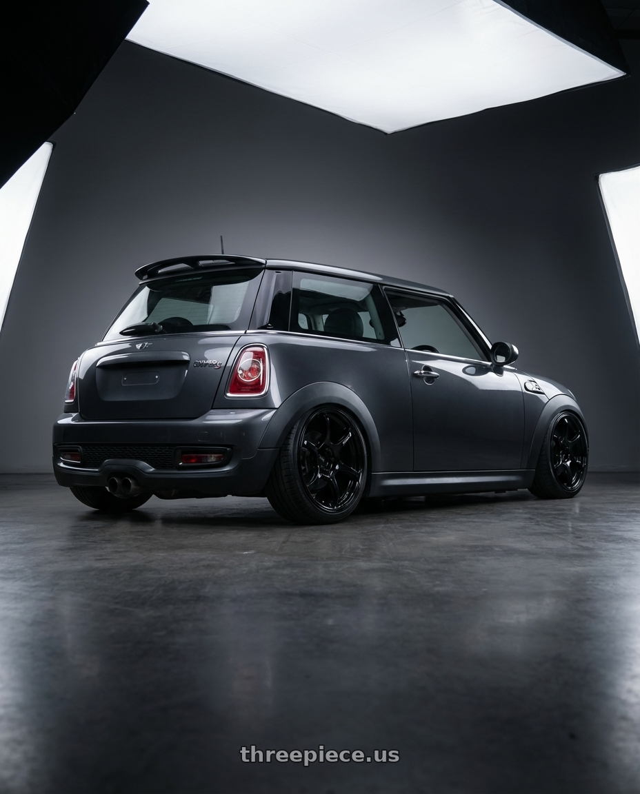 2010 Mini Cooper S R56 with Advan RGIII 4x100 17x7.0+42 Gloss Black wheels rear three quarter view slight stretch tires