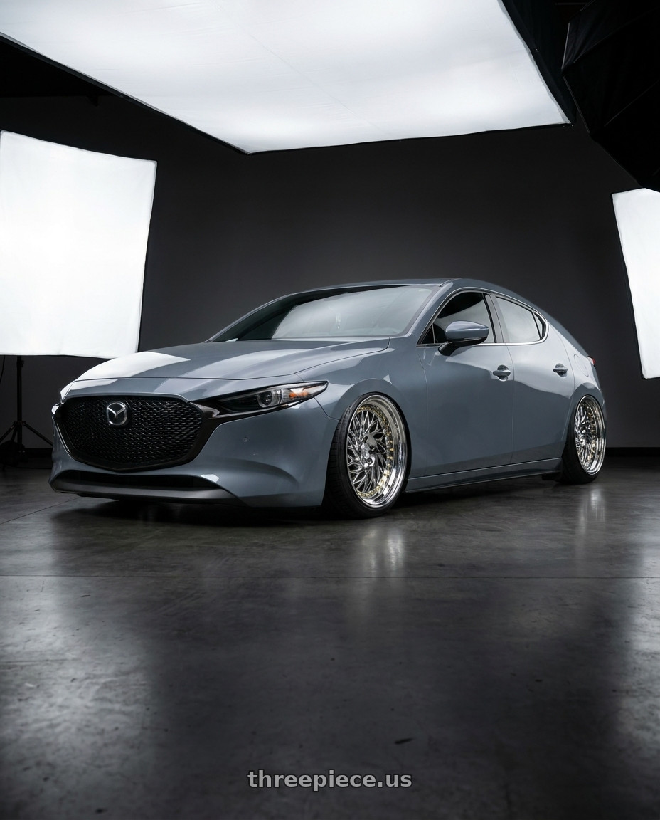2023 Mazda Mazda3 Turbo with Aodhan DS03 5x114.3 18x9.5 +30 Vacuum Chrome w/Gold Rivets wheels