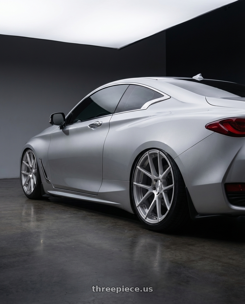 2020 Infiniti Q60 with Avant Garde Wheels M510 5X114.3 20x8.5 +20 Satin Silver wheels rear three quarter view slight stretch tires