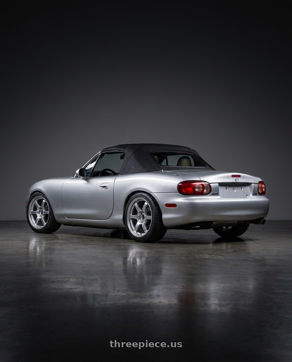 1999 Mazda Miata Base with Gram Lights 57DR 4x100 15x8+35 Grace Silver wheels rear three quarter view square tires