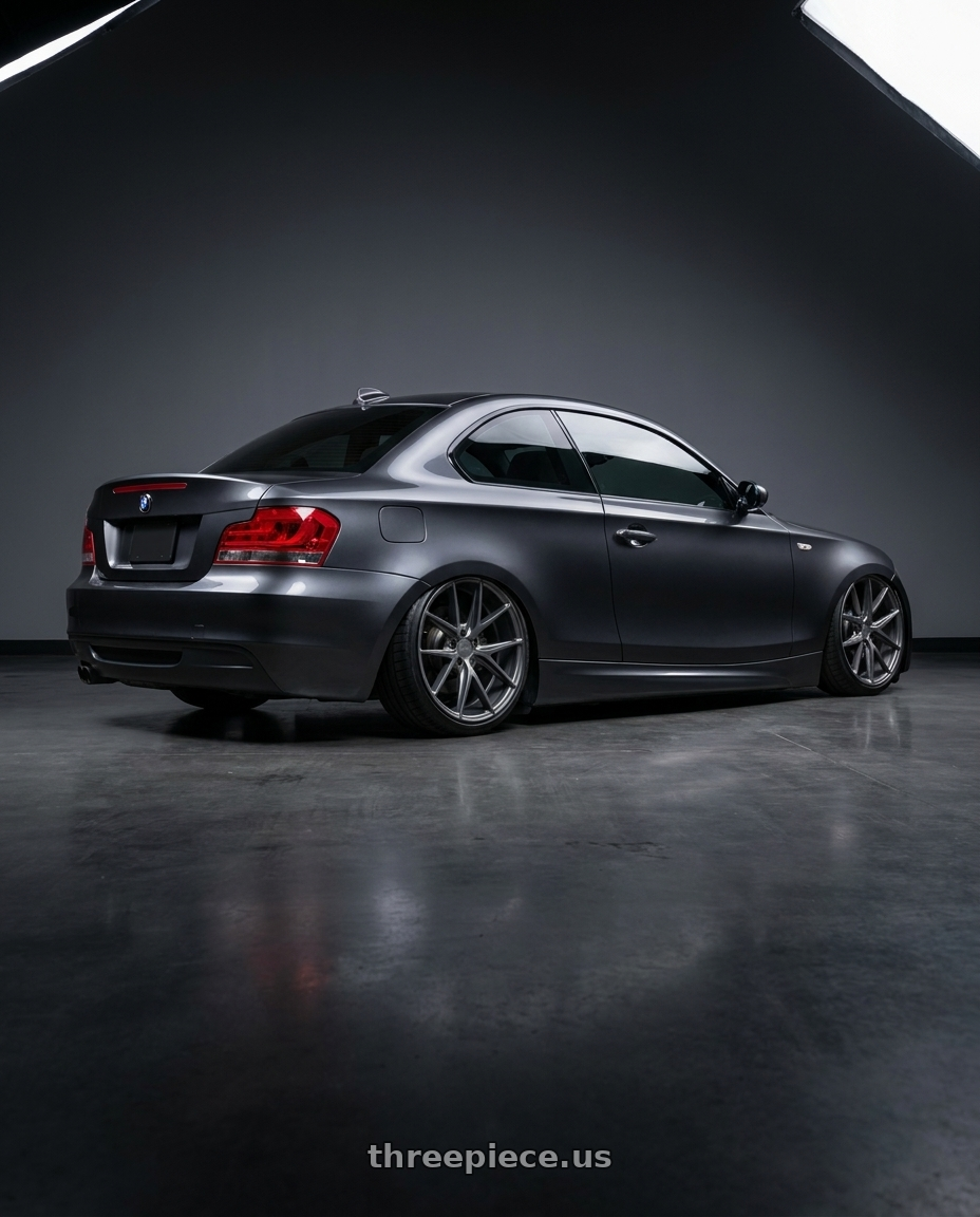 2012 BMW 1 Series E82 with Niche 1PC M116 MISANO 5X120 19X8.5 +35 MATTE GUN METAL wheels rear three quarter view slight stretch tires