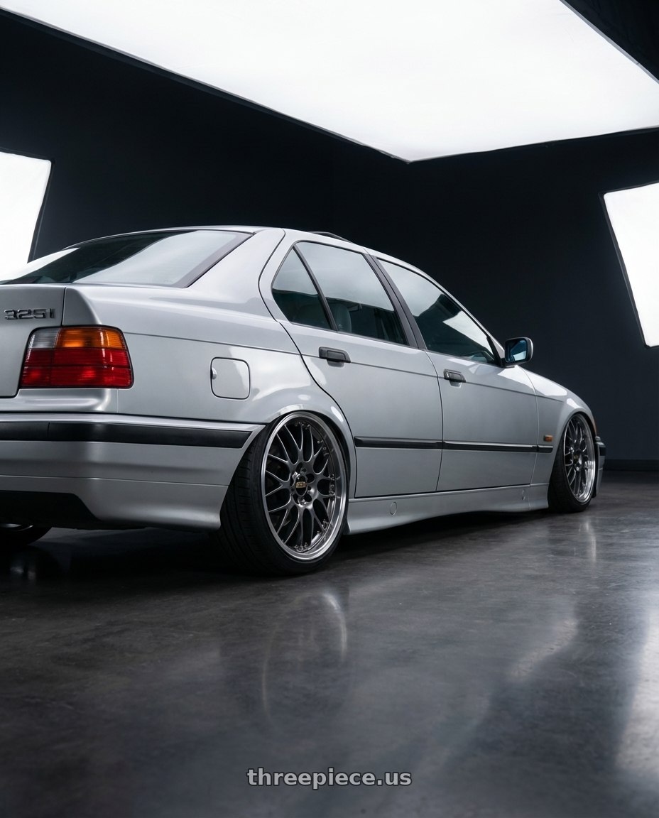1992 BMW 325i Silver with BBS RS-GT 5x130 18x8.0+50 Diamond Black wheels rear three quarter view slight stretch tires
