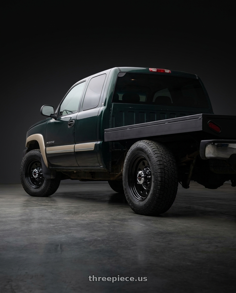 2003 Chevy 2500HD with Vision HD 85H 8x165.1 17x9-12 Gloss Black wheels rear three quarter view square tires