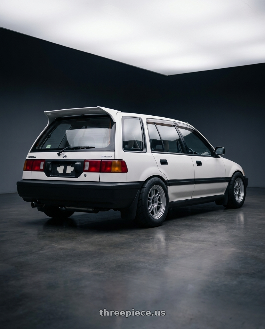1991 Honda civic wagon with Enkei RPF1 4x100 15x7+35 Silver wheels rear three quarter view meaty tires