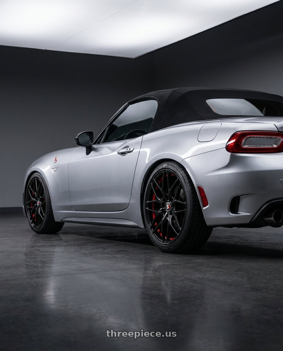 2020 Fiat 124 Spider GT with Spec-1 SP-60 4x100/4x114.3 17x7.5 +42 Gloss Black & Red Undercut wheels rear three quarter view square tires