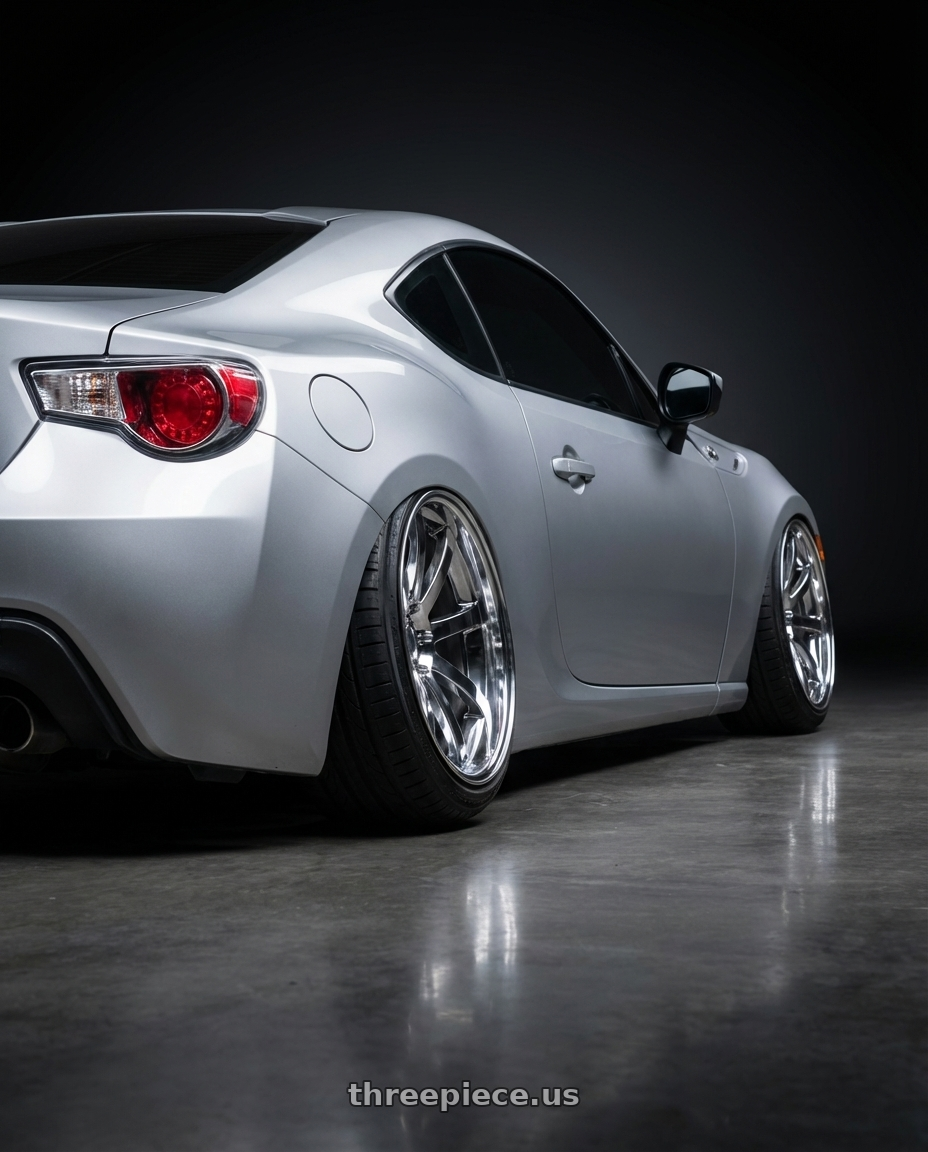 2013 scion frs with OE Wheels CL02 5x115 22x9+18 Chrome wheels rear three quarter view extreme stretch tires