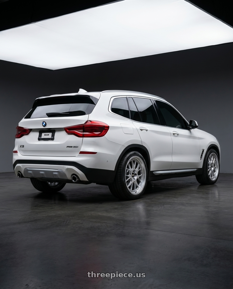 2020 BMW x3 G01 with BBS LM-R 5x112 19x9.5+38 Diamond Silver wheels rear three quarter view square tires