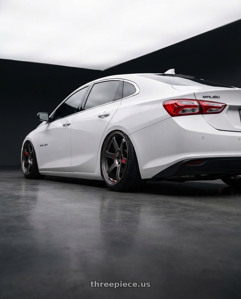 2023 Chevrolet Malibu LT with Volk Racing TE37 Saga SL 5x114.3 18x9.0+45 Pressed Graphite wheels rear three quarter view extreme stretch tires