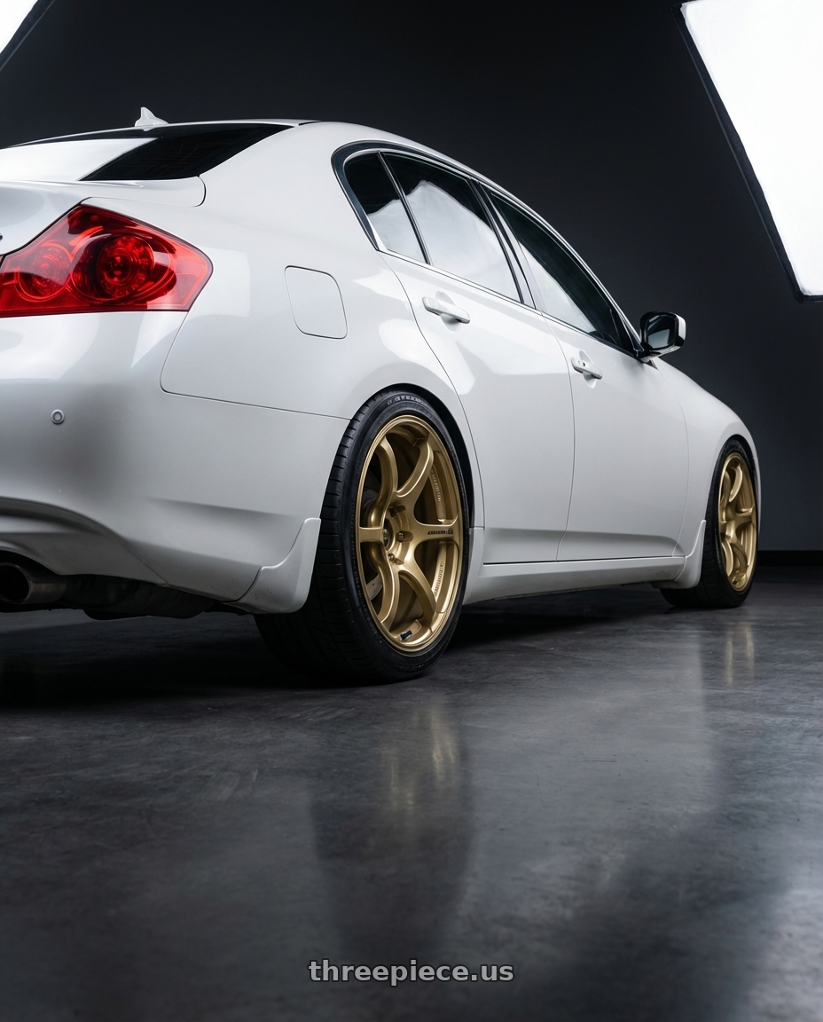 2014 Infiniti G37 Coupe with Advan RGII 5x114.3 19x10+35 Gold wheels rear three quarter view square tires
