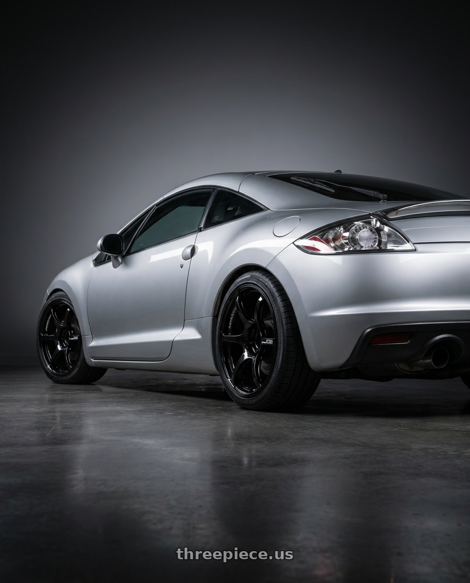 2010 Mitsubishi Eclipse with Advan RGIII 5x114.3 18x10.5+15 Gloss Black wheels rear three quarter view square tires