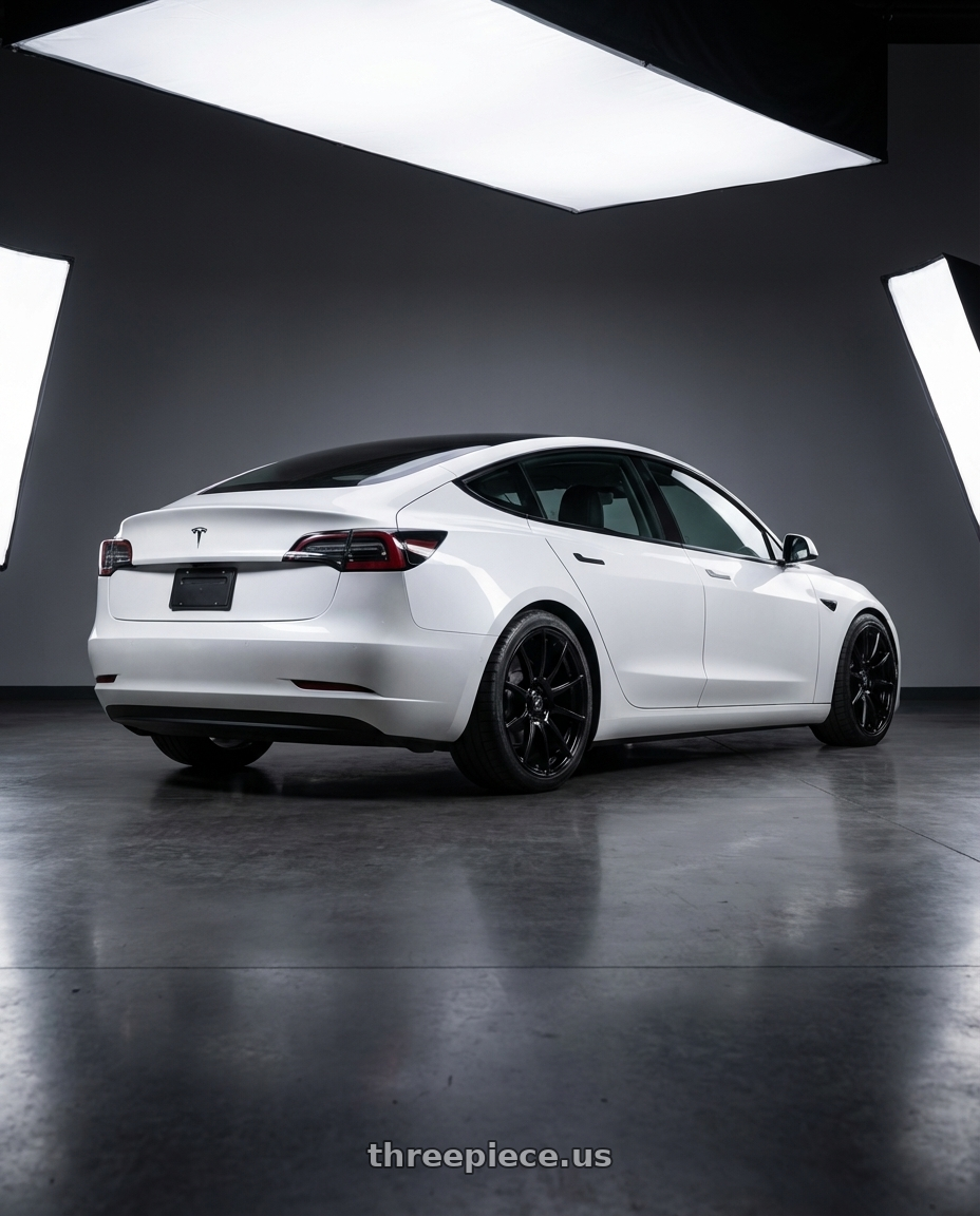 2023 Tesla Model 3 with Forgestar CF10 5x114.3 19x9.5 +29 Gloss Black wheels rear three quarter view square tires