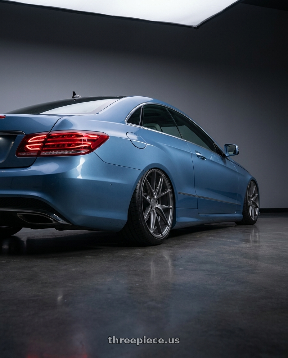 2014 Mercedes-Benz E-Class Coupe C207 with Niche 1PC M116 MISANO 5X112 20X9 +27 MATTE GUN METAL wheels rear three quarter view slight stretch tires