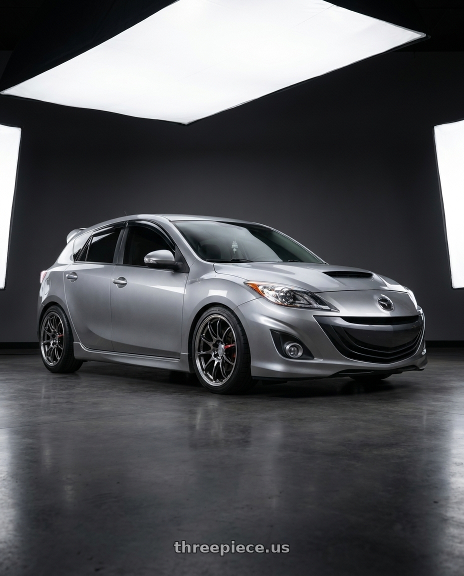2012 Mazda Mazdaspeed 3 with Work Emotion Zr10 5x114.3 18x8.5 +38 Glim Black Diamond Rim cut wheels
