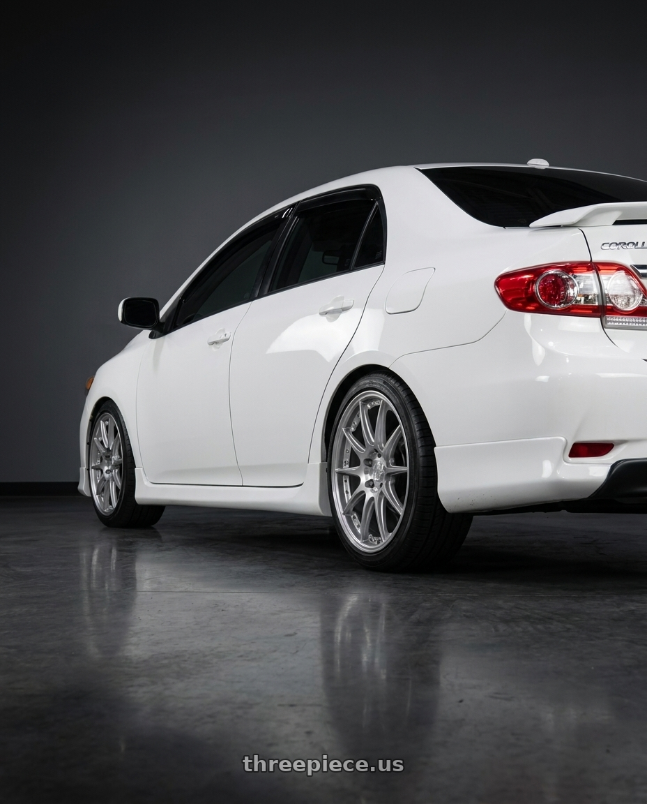 2010 S Toyota Corolla  with Aodhan DS07 5x100 18x9.5+35 Silver w/Machined Face wheels rear three quarter view square tires