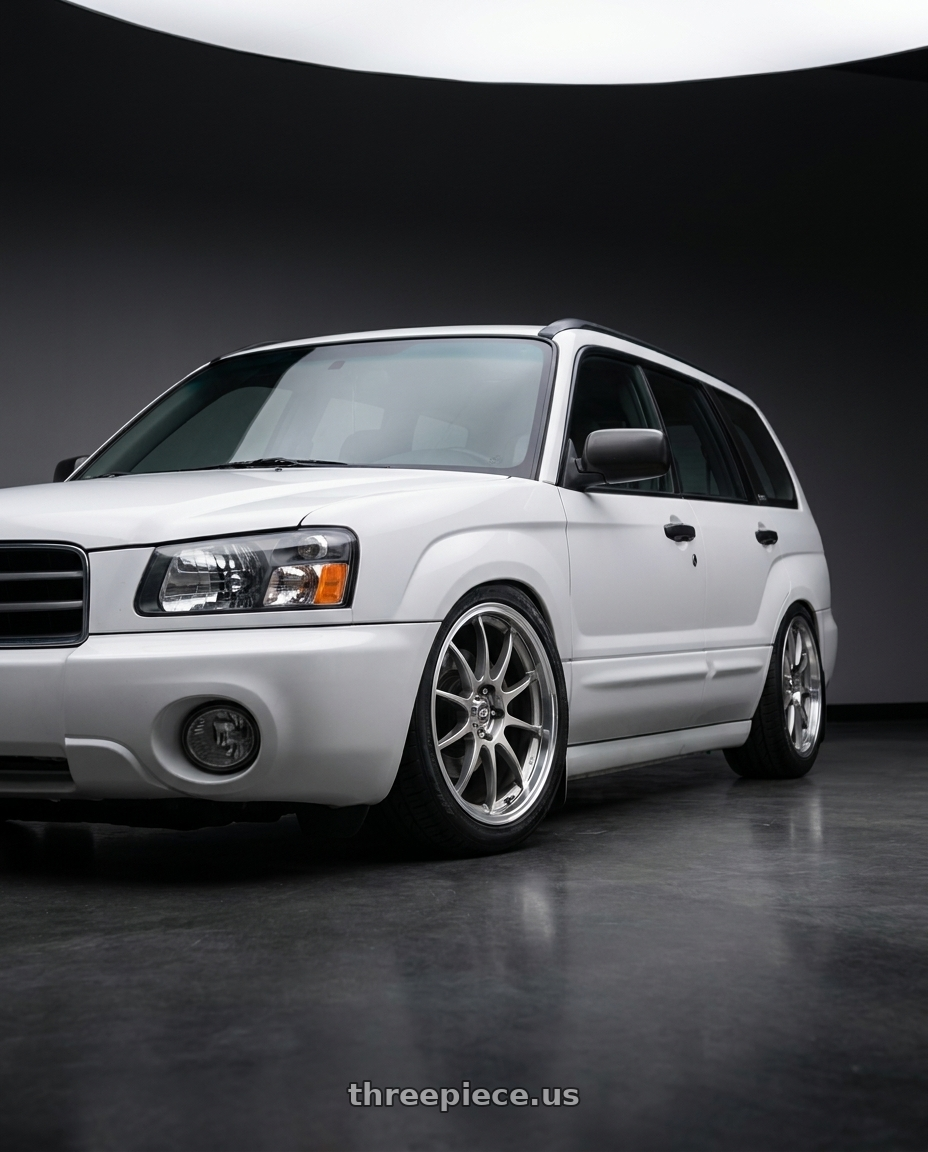 2001 Subaru Forester L White with Enkei J10 4x100/114.3 15x6.5+38 Silver w/ Machined Lip Dia wheels