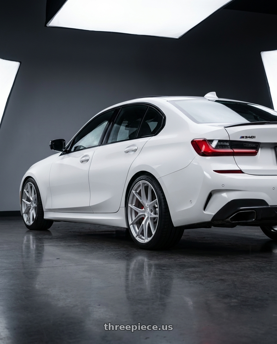 2025 BMW M340i xdrive with Aodhan AFF7 5x112 19x9.5+35 Gloss Silver Machined Face wheels rear three quarter view square tires