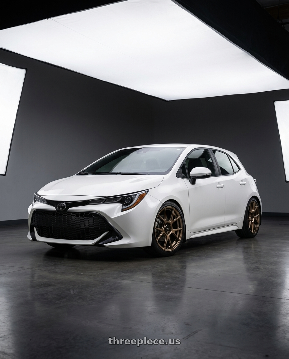 2023 Toyota Corolla Hatchback with Konig Ampliform 5x114.3 18x9.5+35 Gloss Bronze wheels