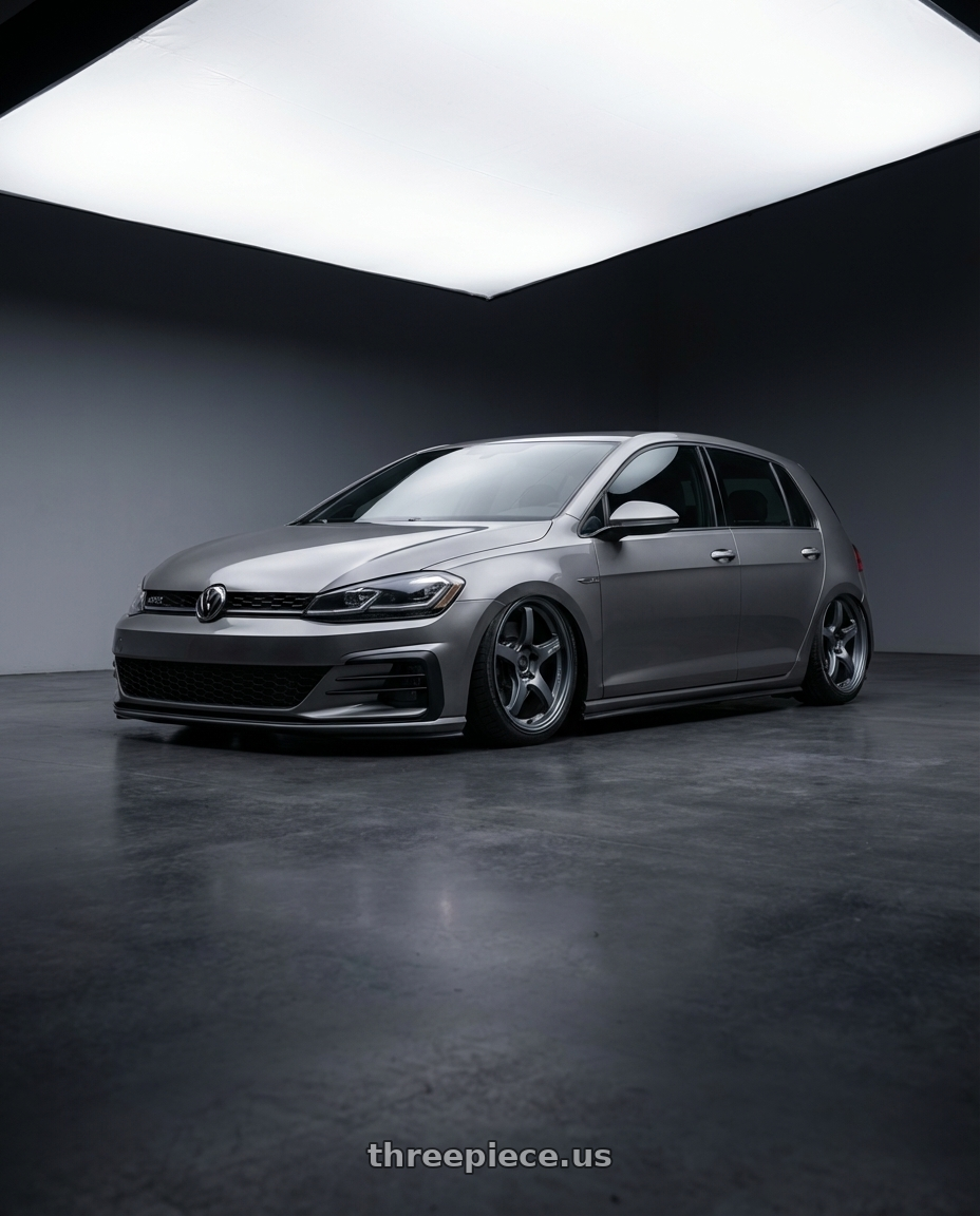 2019 Volkswagen GTI MK7 with Gram Lights 57CR 5x112 19x9.5+25 Gunblue II wheels front three quarter view stanced stance