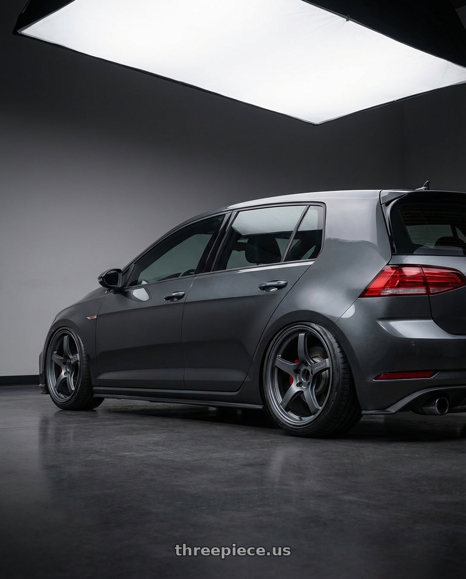 2019 Volkswagen GTI MK7 with Gram Lights 57CR 5x112 19x9.5+25 Gunblue II wheels rear three quarter view slight stretch tires