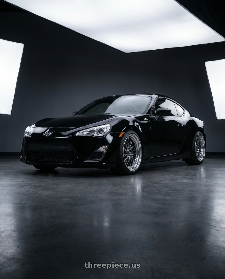 2015 Scion FR-S with Work Vs-Xv 5x100 18x9.5+14 R Disk Brilliant Silver Black wheels front three quarter view lowered stance