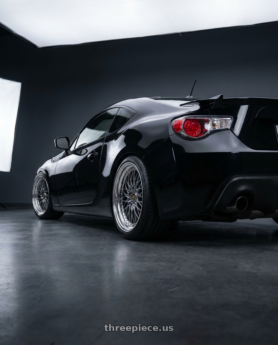 2015 Scion FR-S with Work Vs-Xv 5x100 18x9.5+14 R Disk Brilliant Silver Black wheels rear three quarter view square tires