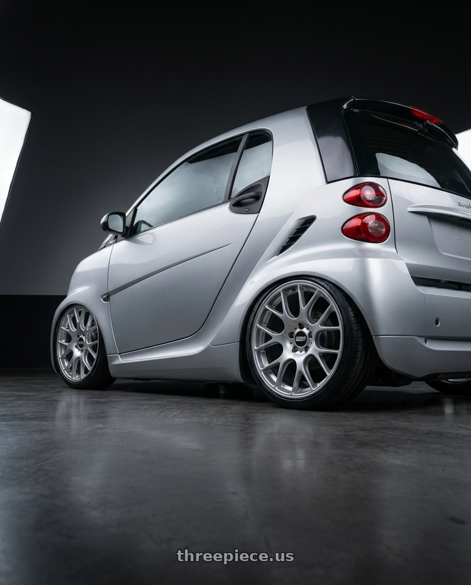 2009 Smart for two with BBS CH-R 5x120 19x9.5 +35 Brilliant Silver Polished Rim Protector wheels rear three quarter view slight stretch tires