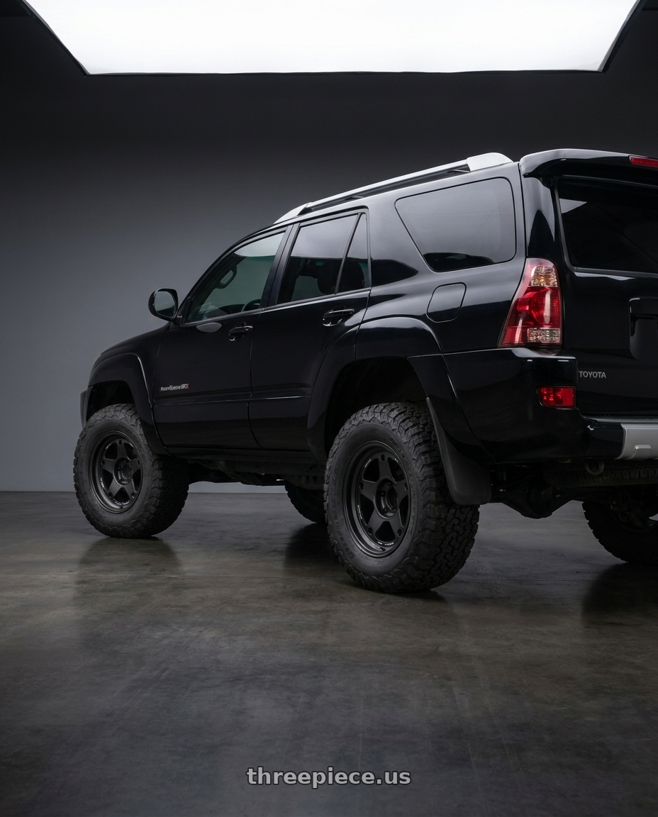 2004 TOYOTA 4RUNNER with Volk Racing RAYS 05X 6x139.7 18x8.5+10 Matte Black wheels rear three quarter view meaty tires